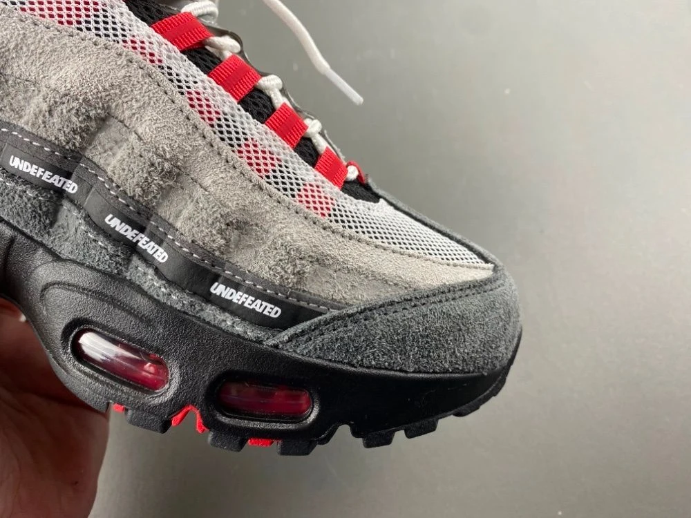 Classic UNDEFEATED x Nike Air Max 95 in grey and red colorway