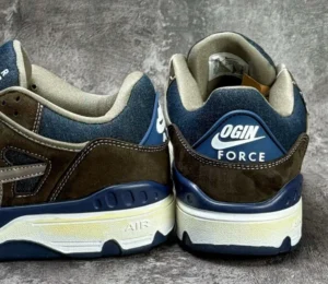 The heel is asymmetrical – left says Nike Air, right says OGIN Force